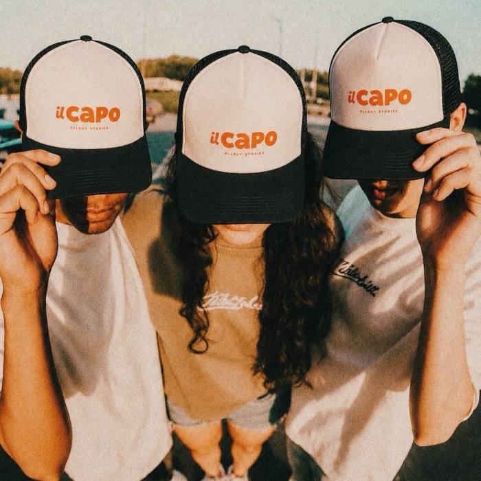 Friends wearing IL CAPO caps